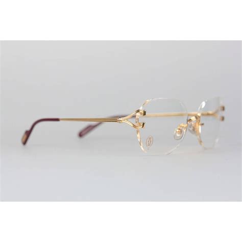 cartier vintage rimless glasses.